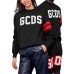 GCDS FELPA GIROCOLLO IN JERSEY DI COTONE BLACK UNISEX CON PATCH LOGO LETTERING WHITE GCDS
