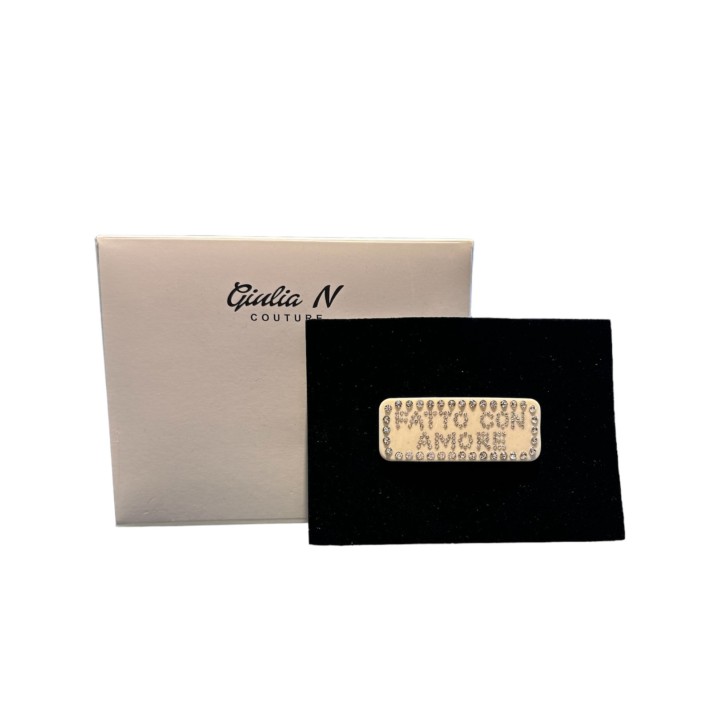 Giulia N Couture Fermacapelli in plexiglass panna con logo FATTO CON AMORE in strass