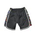 Moschino Boxer da mare nero con logo lettering multicolor