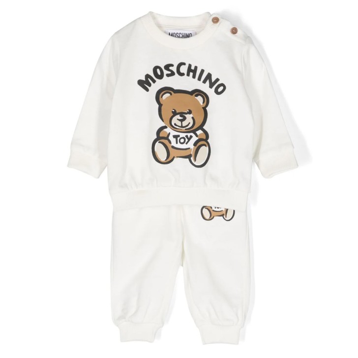 MOSCHINO COMPLETO FELPA E PANTALONE UNISEX IN COTONE BIANCO CON LOGO LETTERING E STAMPA TEDDY BEAR